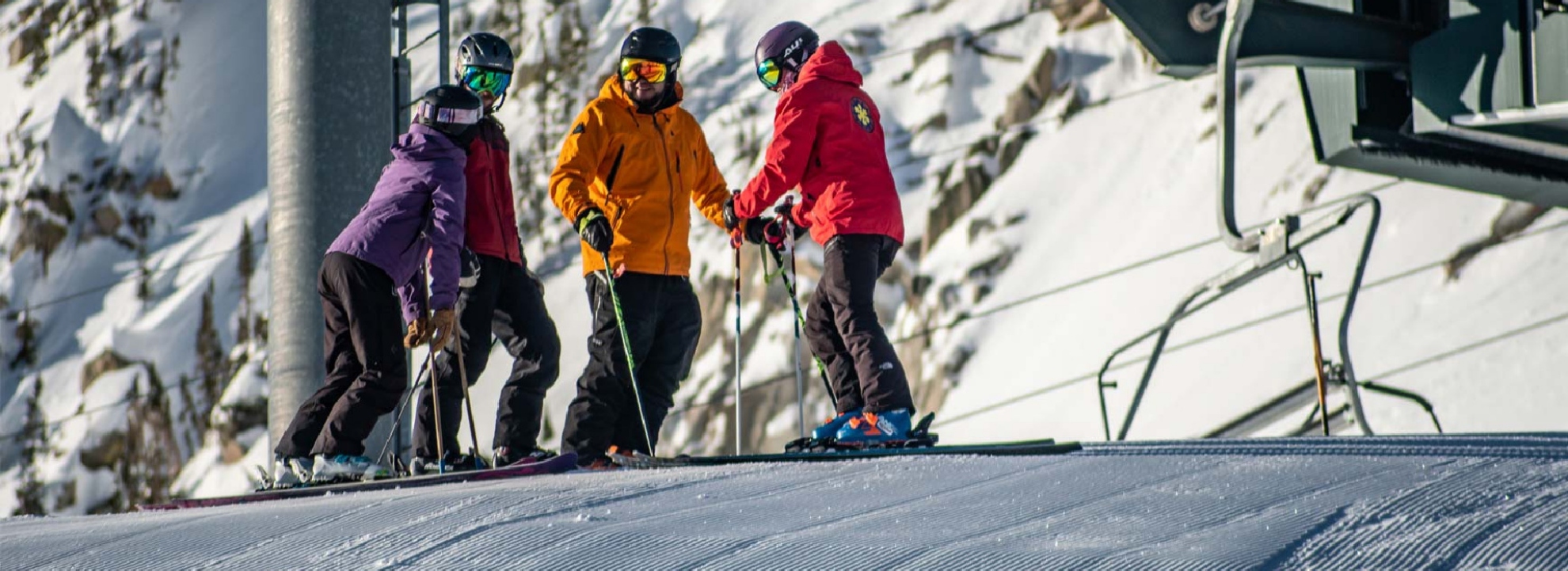 Skiers taking a lesson at Brighton Resort in Utah